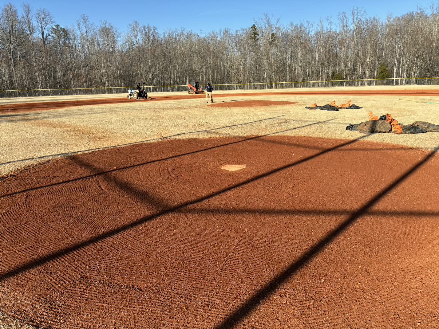 Fresh infield dirt spread and groomed on a baseball diamond